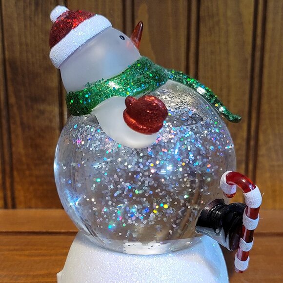 Color Changing Light Up Skiing Snowman Snow Globe - Picture 4 of 4